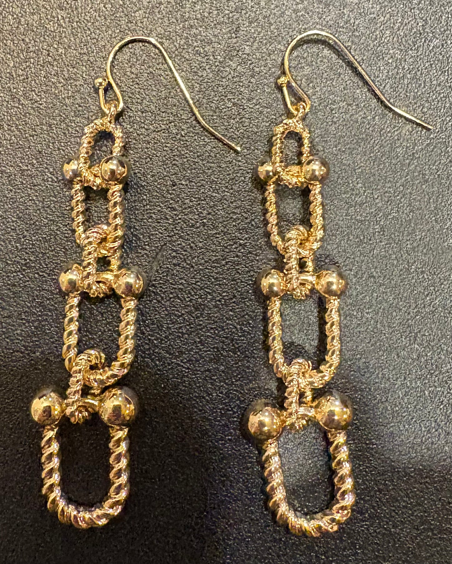 Triple gold link earrings