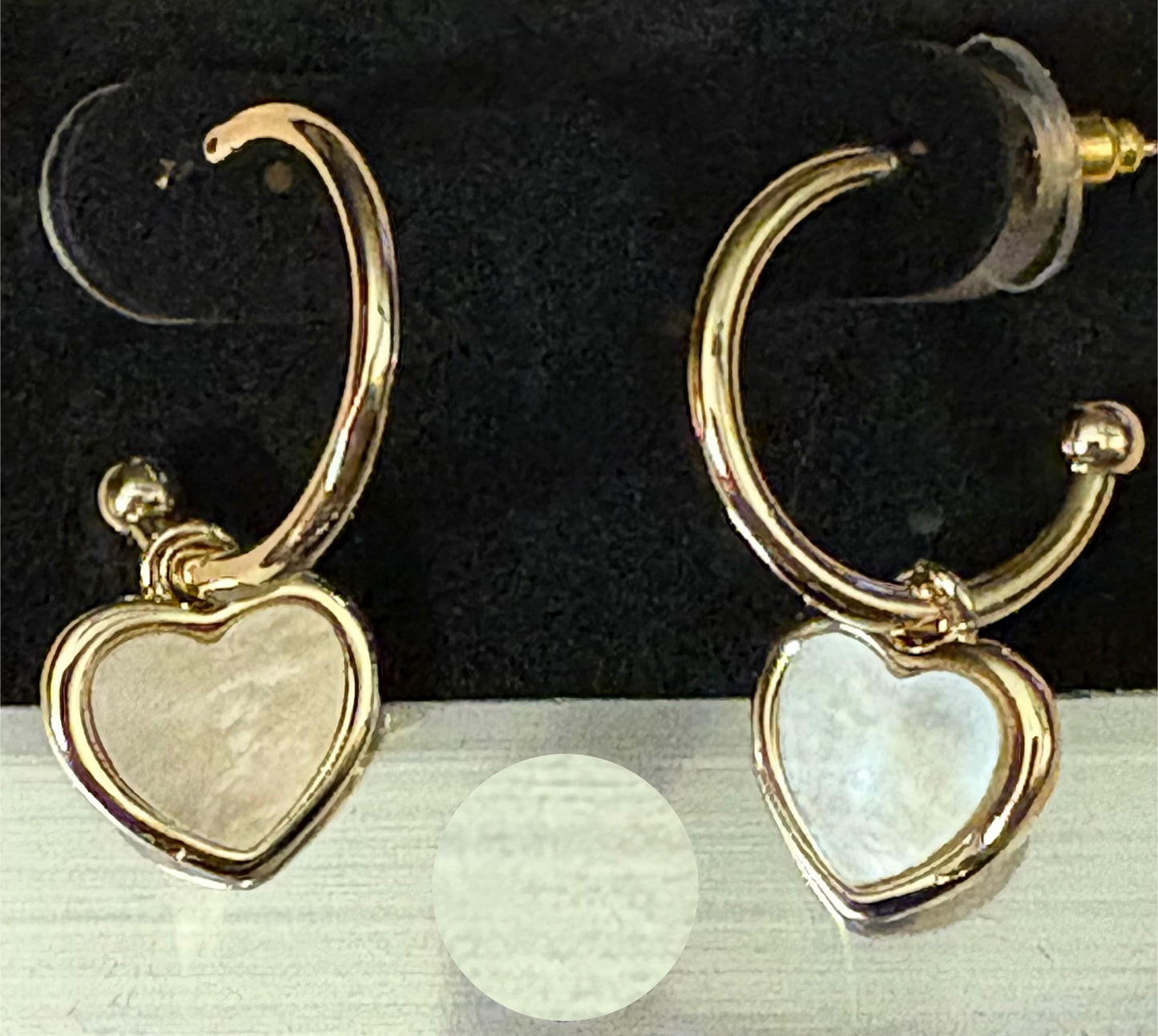 Earrings - Hanging hearts in mother of pearl on gold huggie hoops