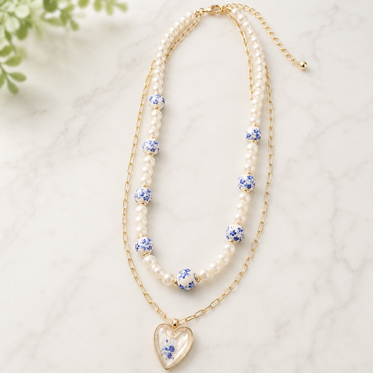 Double Strand Gold & Pearl necklace with blue & white heart pendant