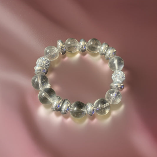 Large Clear beads with gold or silver rounded disc beads and bling beads. Available in 2 colors.