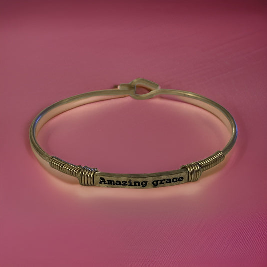 Bracelet with engraved message, "Amazing Grace”. Available in gold and silver