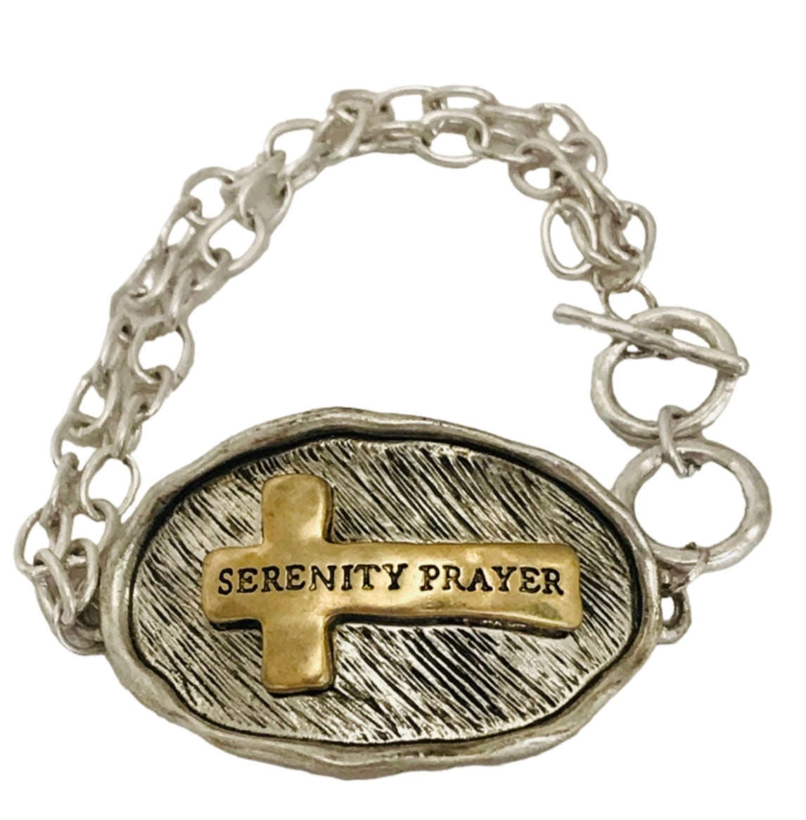 Silver tone toggle bracelet stamped with "Serenity Prayer " on a gold tone cross on the front, and the serenity prayer stamped on the back