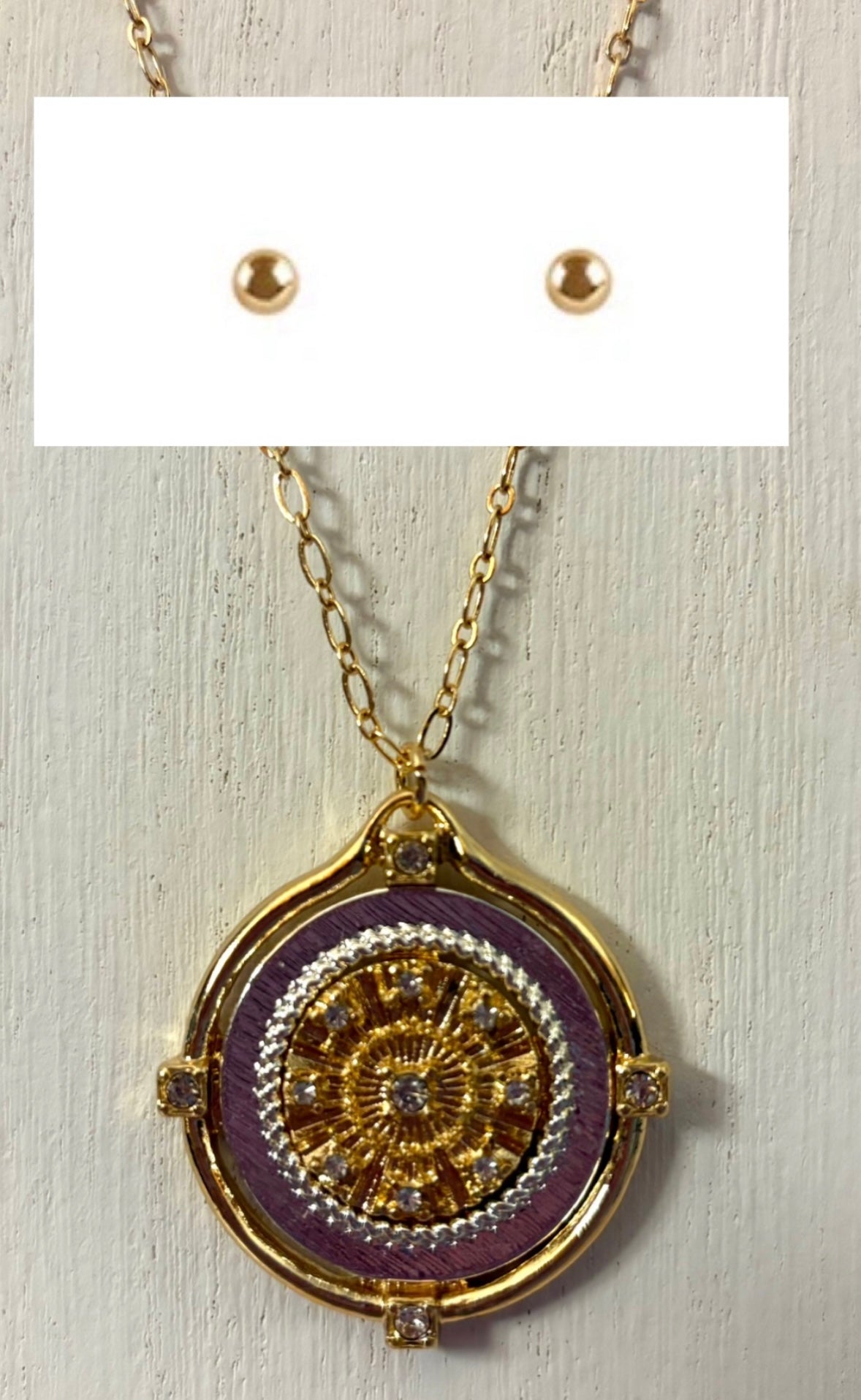 Necklace - Long Medallion Pendant with stud earrings. Gold tone with silver accents and clear stone