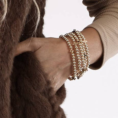 5 Stack Bead and Cross Stretch Bracelet, Two Tone silver beads and gold crosses