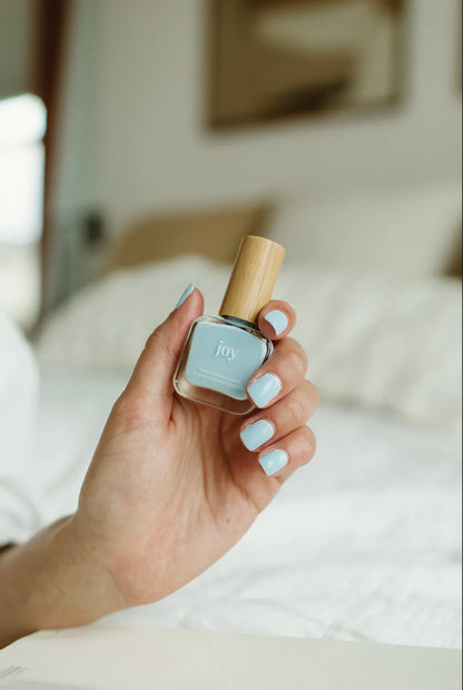 “Joy” Non-toxic Nail Polish with an Inspirational reminder® - the perfect light blue fitting for every occasion.