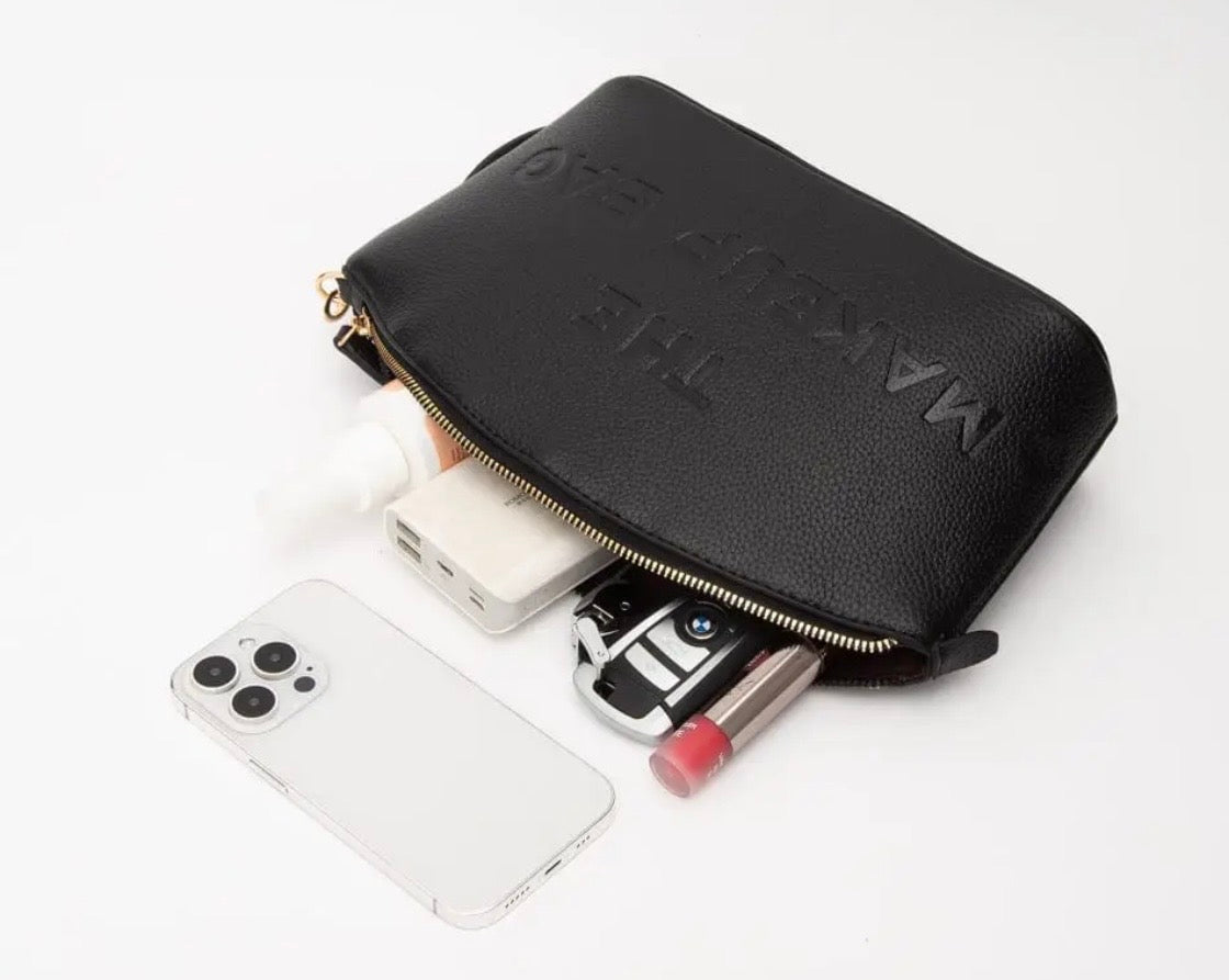 THE MAKEUP BAG - textured faux leather wristlet bag