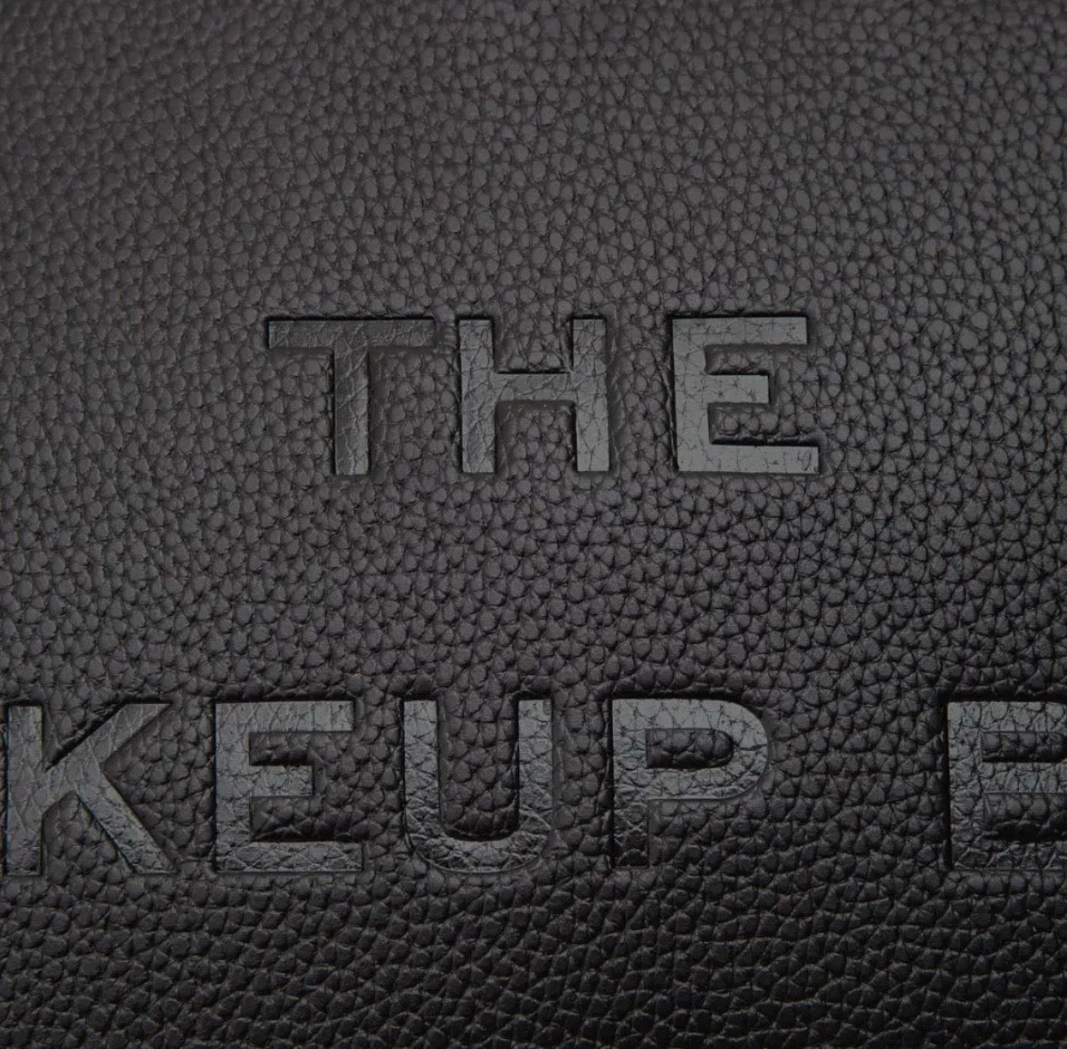 THE MAKEUP BAG - textured faux leather wristlet bag