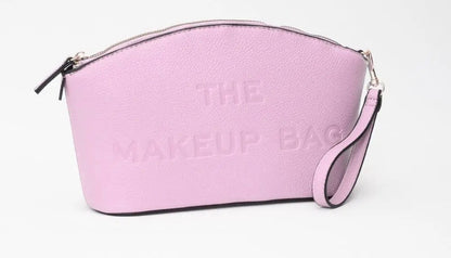 THE MAKEUP BAG - textured faux leather wristlet bag